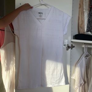 V neck white shirt w sea through words